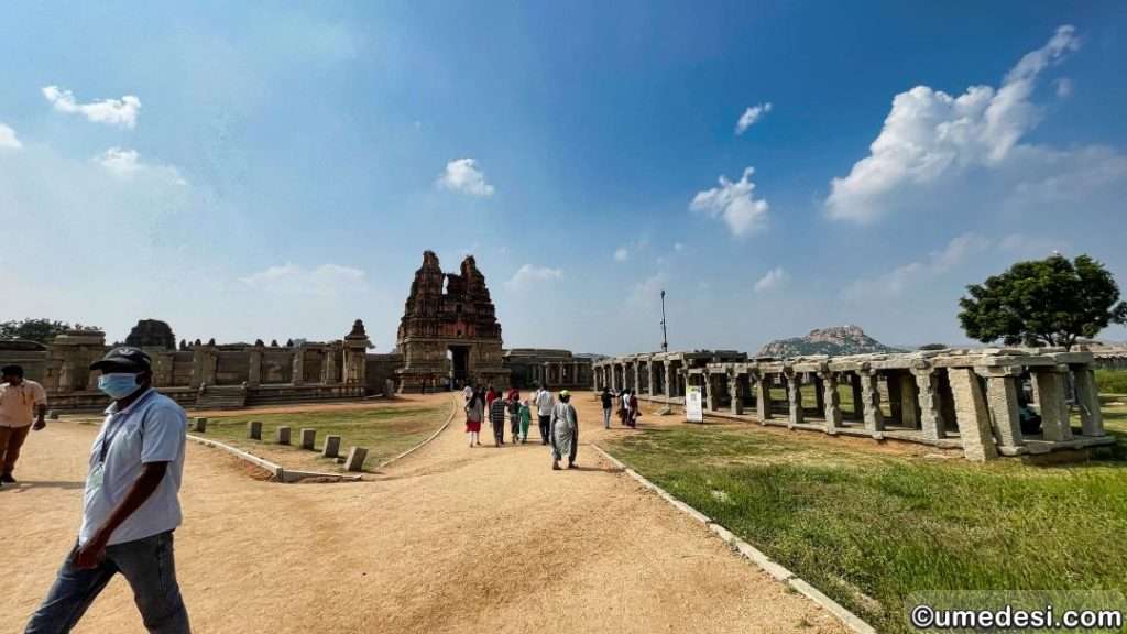 Grand entrance of Vijaya Vittala Temple with surrounding ancient stone bazaar in Hampi.